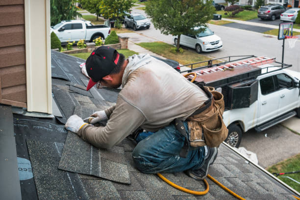 Professional Flat Roof Repair technician working in Acton, MT